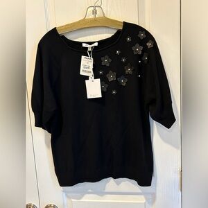 Quarter sleeve sweater